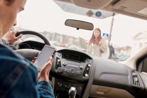 Distracted Driver with Woman in Road - Pedestrian Accident in Sioux Falls