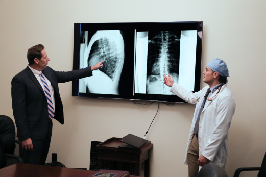 Doctor explaining X-ray.