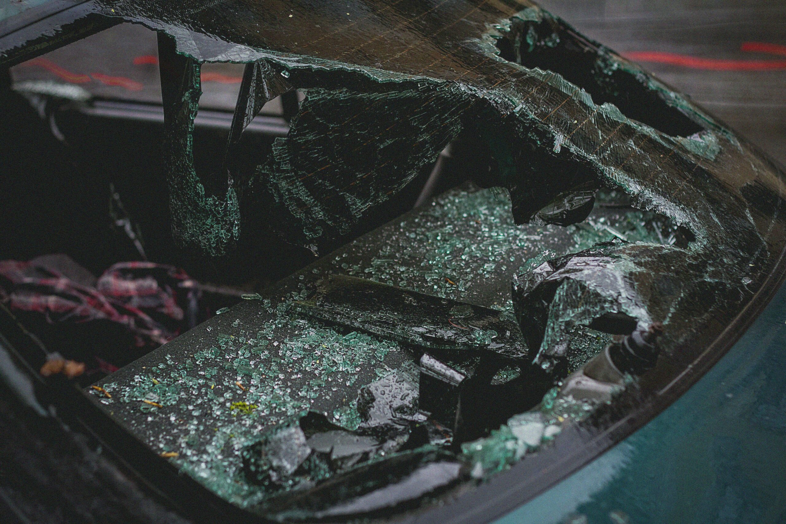 Shattered car rear windshield after traffic collision in Boise Idaho accident scene